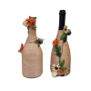 Decorative Bottles.  Recycled bottles,  Artificial Flowers and Embroidery Thread.